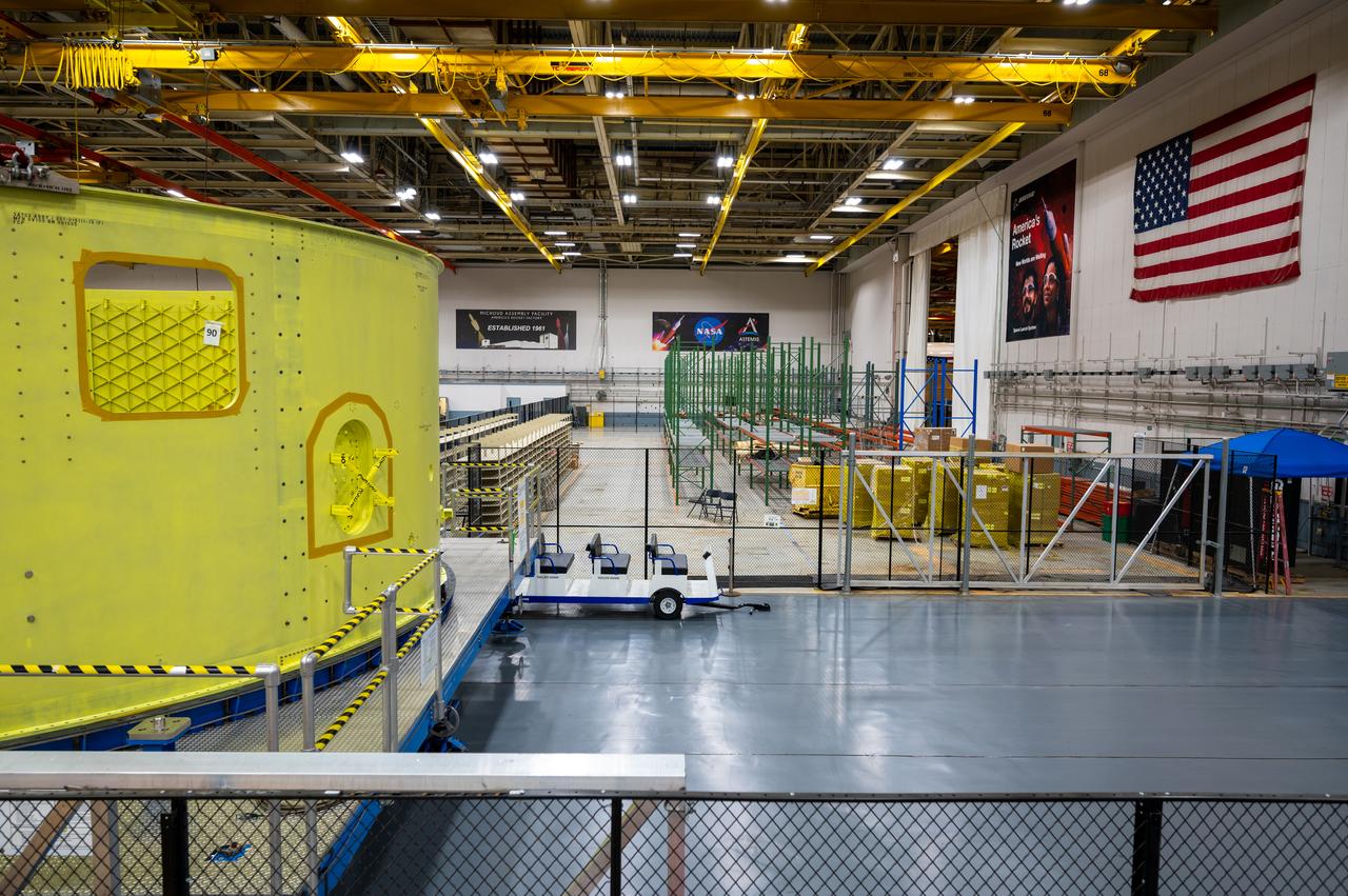 Crews at NASA’s Michoud Assembly Facility in New Orleans move the forward skirt of NASA’s Space Launch System (SLS) rocket to another part of the facility Dec. 15. Teams are preparing to apply the thermal protection system to the flight hardware, which will protect it from the extreme temperatures during launch and flight. The forward skirt is part of the core stage that will power the SLS rocket for the Artemis III mission. The forward skirt houses flight computers, cameras, and avionics.. The SLS core stage is made up of five unique elements: the forward skirt, liquid oxygen tank, intertank, liquid hydrogen tank, and the engine section. When fully stacked, the forward skirt is located at the top of the core stage and connects the stage to the upper part of the rocket. Together with its four RS-25 engines, the rocket’s massive 212-foot-tall core stage — the largest stage NASA has ever built — and its twin solid rocket boosters produce 8.8 million pounds of thrust to send NASA’s Orion spacecraft, astronauts and supplies beyond Earth’s orbit to the Moon and, ultimately, Mars. Offering more payload mass, volume capability and energy to speed missions through space, the SLS rocket, along with NASA’s Gateway in lunar orbit, the Human Landing System, and Orion spacecraft, is part of NASA’s backbone for deep space exploration and the Artemis lunar program. No other rocket is capable of carrying astronauts in Orion around the Moon in a single mission.